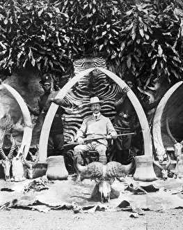 Skull Prints: Hunter Sitting in Front of Trophies