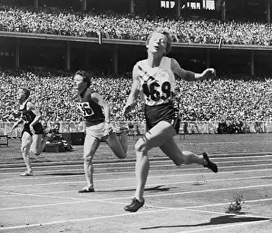 1956 Olympic Games Melbourne Prints: Hurdlers Racing to Finish Line