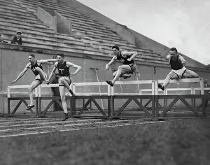 Prints of Four athletes compete in a hurdles event, circa 1925. (Photo by Frederic Lewis/Archive Photos/Getty Images) Urban Echoes of America’s Golden Age: Hurdling