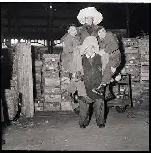 Grocery Store Prints: Husky Strongman In Hat Lifting Three Men