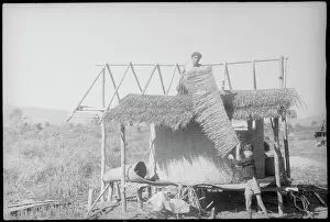 Indochina Prints: Hut Being Repaired by Villagers