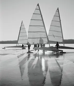 Ice Boats Sitting on a Lake