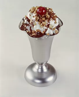 Images Dated 30th July 2011: Ice cream sundae on white background, close-up
