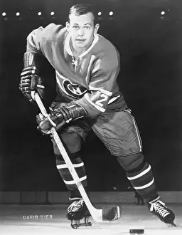 Hockey Stick Prints: Ice Hockey Player Yvan Cournoyer Holding Hockey Stick