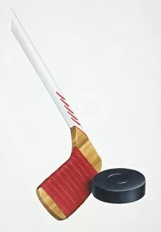 Images Dated 30th March 2006: Ice hockey stick striking rubber disc, close up