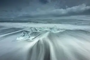 Fred Concha Photography Prints: Ice rests on the beach off the inlet to Jokulsarlon Glacial Lagoon in southwest Iceland