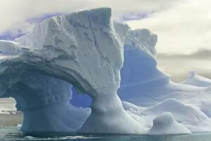 Polar Climate Gallery: iceberg with arches, Antarctic Peninsula
