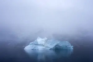 Iceberg in dense fog, King Oscar Fjord, Greenland National Park, Denmark