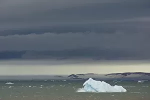 Images Dated 30th July 2012: Iceberg floating in Palanderbukta fjord during strong winds and storm clouds, Nordaustlandet