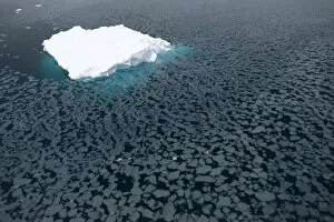 Images Dated 5th March 2013: Iceberg surrounded by slush, Paradise Bay, Antarctic Peninsula, Antarctica