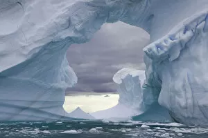 Polar Climate Gallery: Icebergs with arch, Antarctic Peninsu