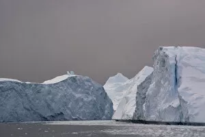 Images Dated 16th April 2015: Icebergs against dark sky, Ilulissat, Greenland