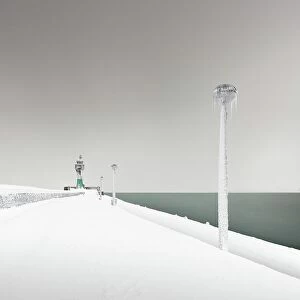 Ronny Behnert Collection: Iced lighthouse in the harbour of Sassnitz, Ruegen, Germany