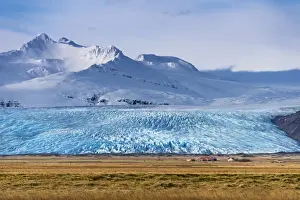Bergen Prints: Icelandic farmstead with glacier tongue and snow-covered mountains, Hofn, Iceland