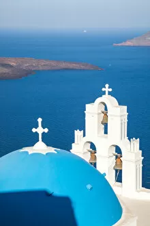 Cross Gallery: Iconic blue cupola over the sea Santorini Greece