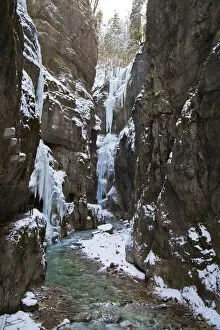 Icy gorge with a mountain stream and steep rock walls, Partnach Gorge, near Garmisch-Partenkirchen, Upper Bavaria