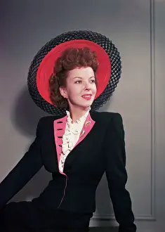 Ida Lupino In Hat And Suit