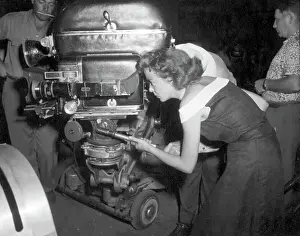 Filming Prints: Ida Lupino Looking Through Movie Camera