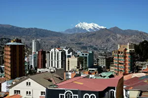 Andes Collection: Illimani Glacier, 6, 439 m, at front the skyscrapers of La Paz, Departamento La Paz, Bolivia
