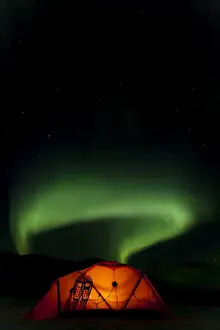 Polar Lights Prints: Illuminated expedition tent and traditional wooden snow shoes