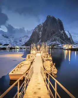 Hamnoy Fishing Village Lofoten Island Prints: Illuminated landing stage, jetty at the harbour of the fishing village Hamnoy Polar Night