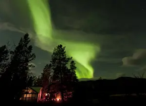 Phenomenon Prints: Illuminated, lit wall tent, cabin with swirling northern polar lights