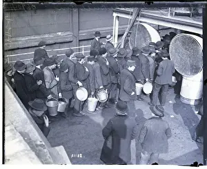 Pail Prints: Immigrants in Line Holding Buckets