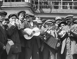 Immigrants in Route to America Playing Music