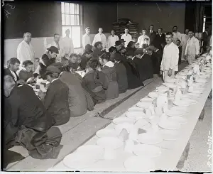 Kitchen Prints: Immigrants Being Served Dinner