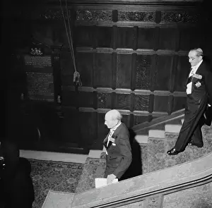 Prints of British politician Clement Attlee (1883-1967) walking down a staircase at the Drapers Hall in the City of London, England, 7th December 1955 A Quiet Strength: A Leader Who Shaped Modern Britain: Inaugural Colonial Williamsburg Foundation Award, 1955