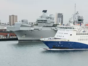 Images Dated 13th June 2018: Incoming ferry viewed passing HMS Queen Elizabeth aircraft carrier
