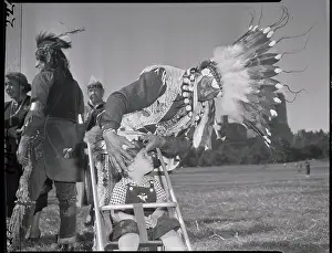 Mohawk Prints: Indian Chief Places Bonnet On Baby'S Head