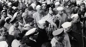 Funeral Prints: Indian Officials Carry Ashes of Gandhi