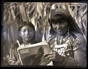 Indigenous Woman Reading Magazine