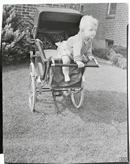 Exiting Prints: Infant Attempting to Leave Stroller