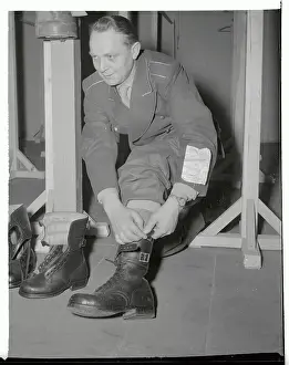 Infantryman Trying on Boots