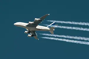 Airplane Prints: Inflight view of an Airbus A380-841 wide body airliner with contrails