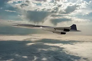 Inflight view of a British Aerospace Concorde SST (Supersonic Transport) in a dramatic sunset sky