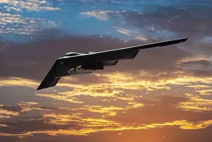 Inflight view of a USAF Northrop Grumman B-2A Spirit stealth bomber in a sunset