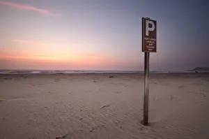 Access Prints: Information sign on beach at sunrise, Estuary Beach, St Lucia, Kwazulu-Natal, South Africa