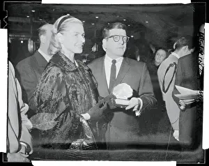 Prints of (Original Caption). Ingrid Bergman receives gold lifetime pass to the Roxy Theater managing director Robert C. Rothafel during visit to the showplace where Anastasia, in which she stars, is playing A Timeless Icon: Ingrid Bergman Receiving a Roxy Theater Lifetime Pass