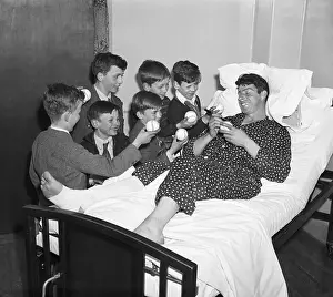 Autograph Prints: Injured Joe Dimaggio Signing Autographs