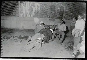 Attica Prints: Injured Prisoners Sitting in Makeshift Hospital