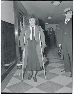 Injured Woman on Crutches
