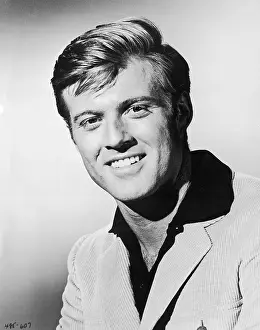 Prints of 1965: American actor Robert Redford smiles in a corduroy jacket in a promotional headshot portrait for the film, Inside Daisy Clover'. (Photo by Hulton Archive/Getty Images) Robert Redford: Classic Hollywood Elegance: Inside Daisy Clover