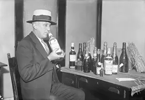 Inspector Sniffing Liquors