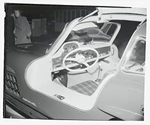 Prints of (Original Caption). Slipping under the wheel of this sports car is a cinch, even for a fat driver Vintage Car Collection Prints: Interior of Mercedes-Benz