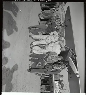 International Pilots Posing in Front of Plane