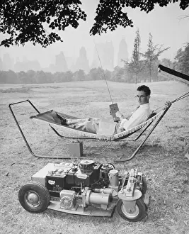 Remote Control Prints: Inventor Demonstrating Remote Control Lawn Mower