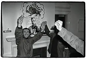 Iranian Protesters With Arms Raised